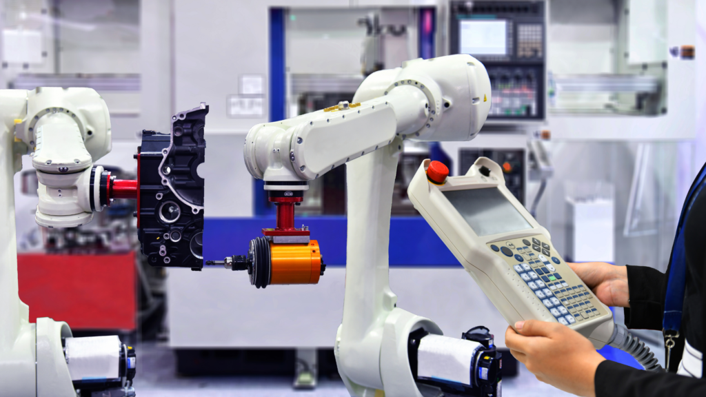 ロボットインテグレータによるティーチング作業の写真